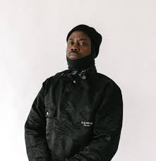 KJ SPIO BIOGRAPHY