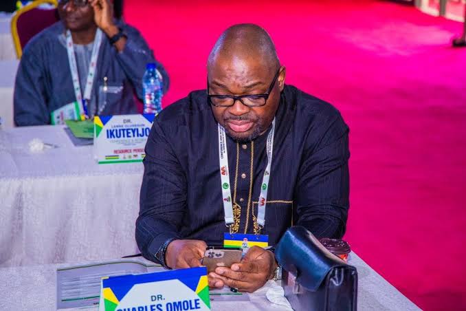 Dr. Charles Omole Career